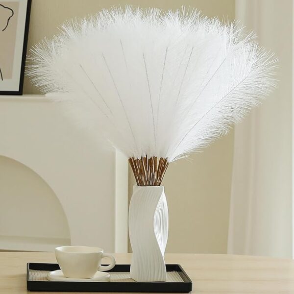 Minimalist white faux feather bouquet in modern twisted ceramic vase for clean, elegant home decor