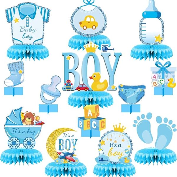 Blue-themed baby boy shower table centerpieces with cute icons like bottles, bibs, toys, and baby clothes