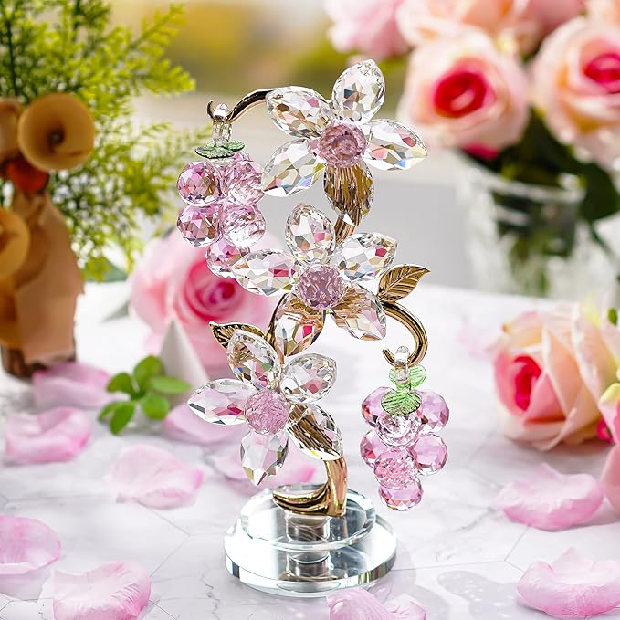 A crystal pink grape decor figurine with a rotating base, designed as a collectible ornament for home display or as a table centerpiece